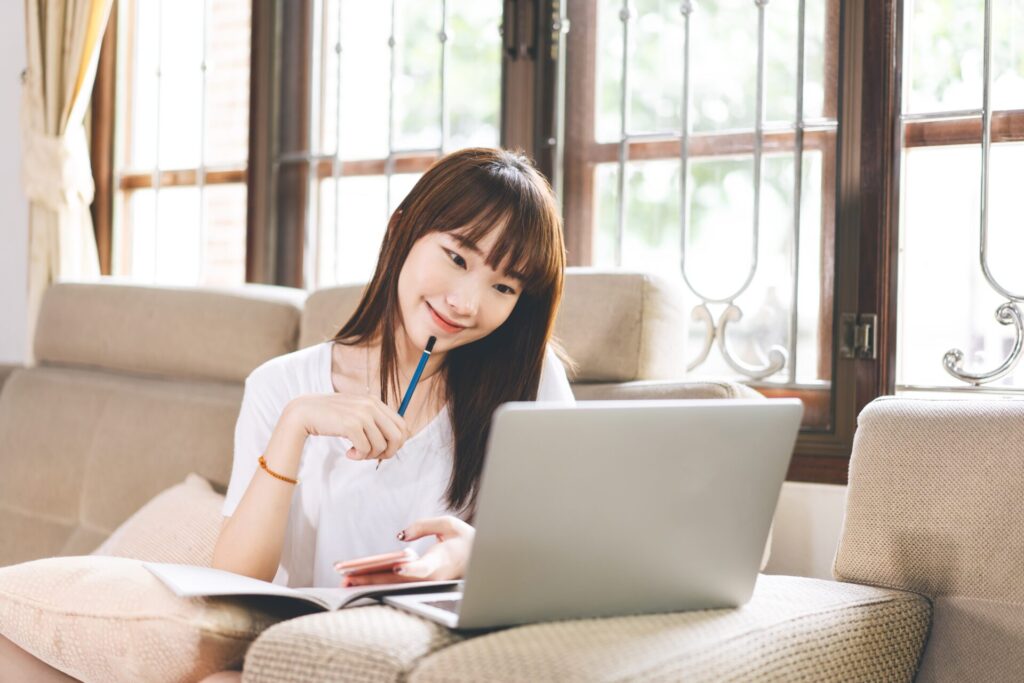 Young,Adult,Asian,Woman,Stay,At,Home,With,Education,Time.