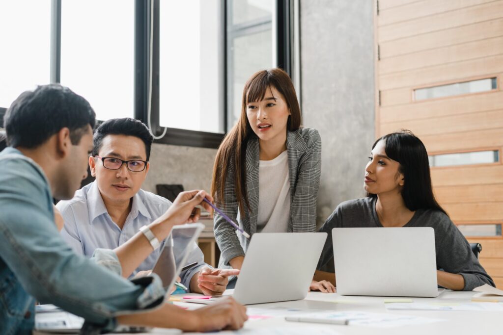 Multiracial,Group,Of,Young,Creative,People,In,Casual,Wear,Meeting