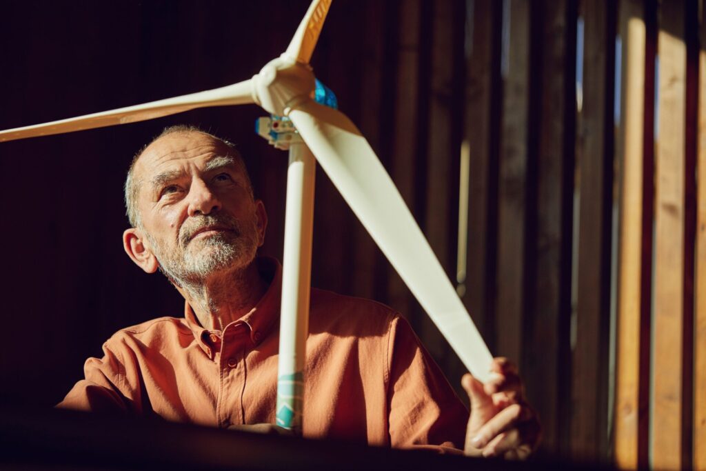 Senior,Engineer,Working,On,Wind,Energy,Solutions ,Looking,At,Wind