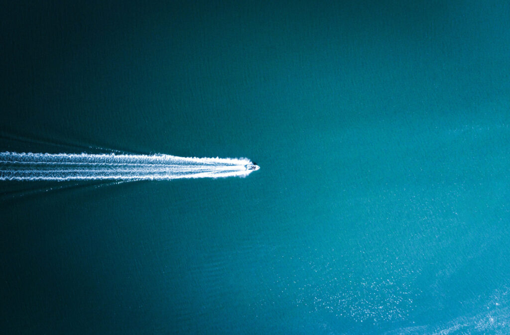 Symmetrical,Photo,With,Boat,Centered,In,Water