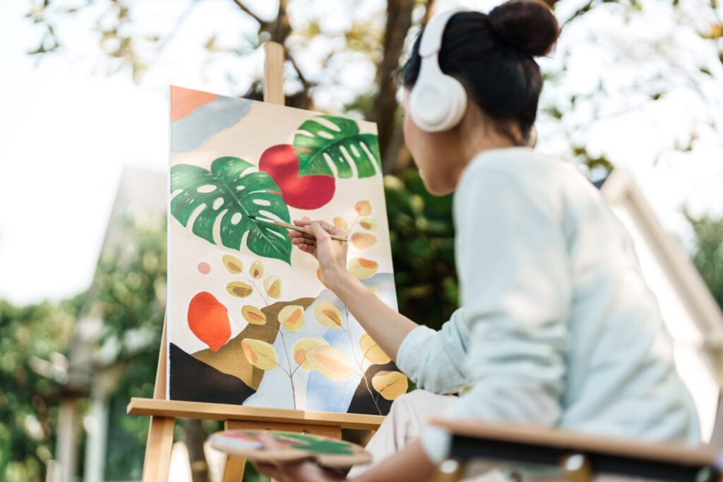 Young,Asian,Woman,Artist,Painting,On,Canvas.,Female,Artist,Drawing