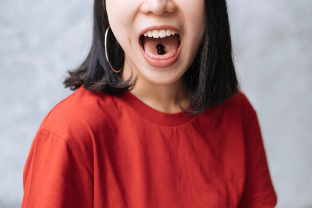 Portrait,Of,Asian,Hipster,Woman,In,Red,Hat,And,T shirt
