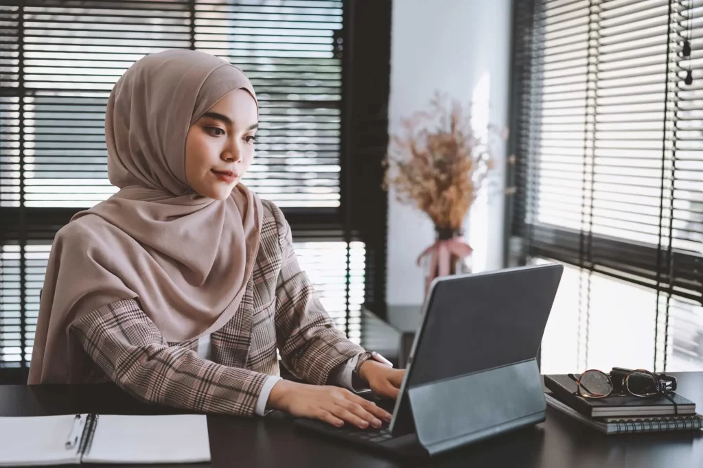 asian muslim woman working 1851893692