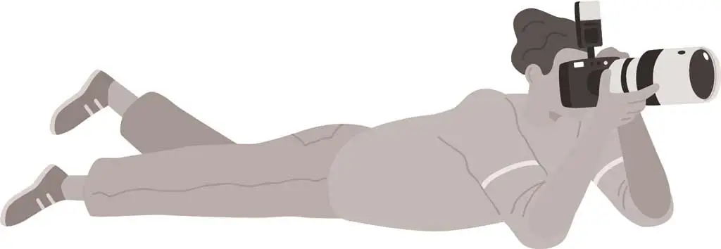 photographer laying down for camera shot 1847754670