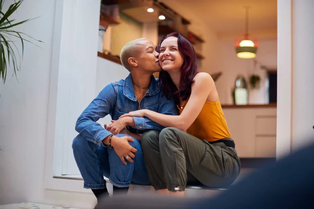 couple kising on step in home 1839295255