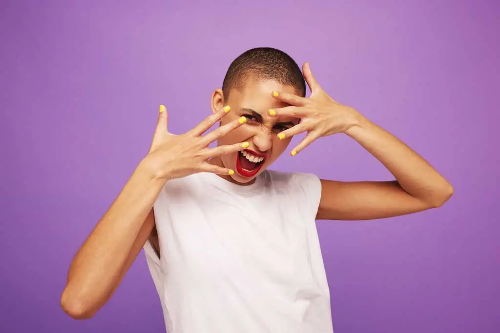 woman poses with painted nails 2022561611