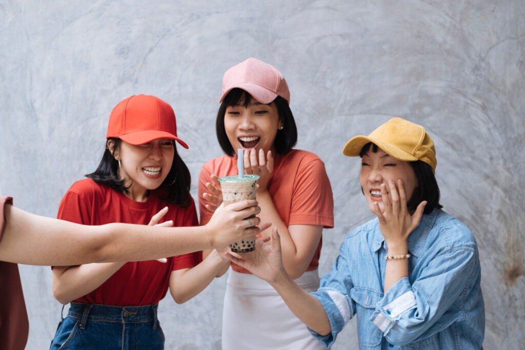 Three,Cheerful,Asian,Female,Teenager,Friends,Enjoying,With,Bubble,Milk