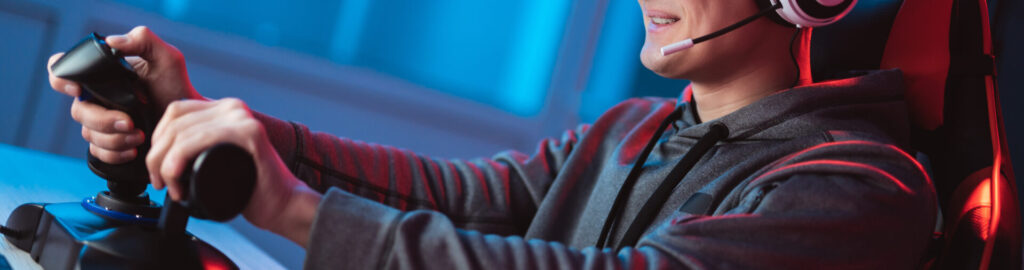 The,Gamer,Sitting,At,The,Table,And,Playing,Video,Games